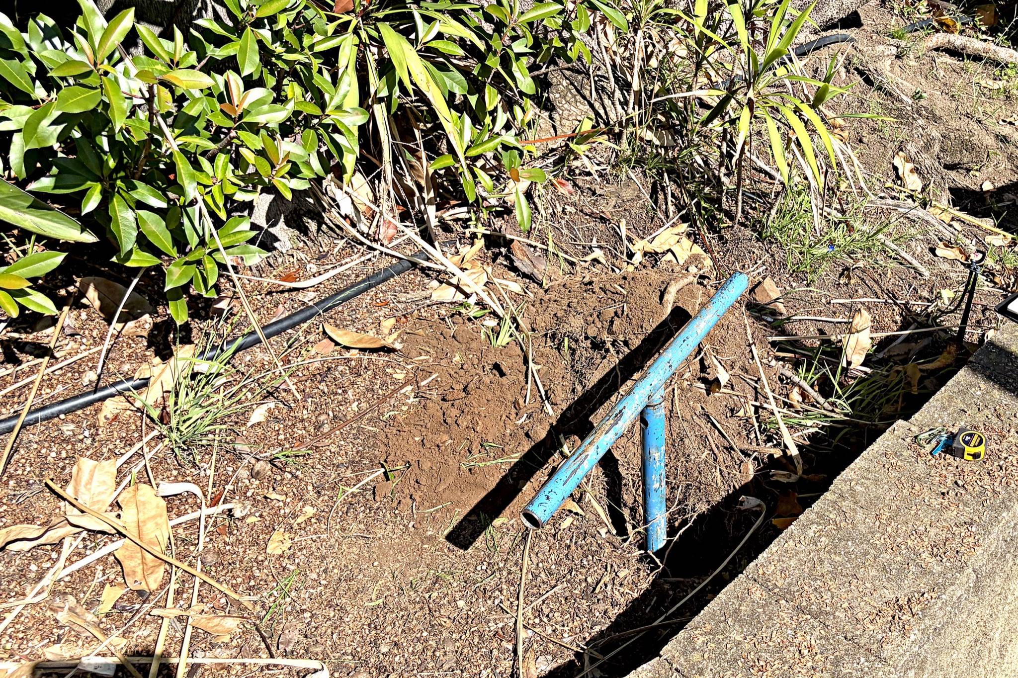 Motorised hand-auger borehole in a restricted-access Sydney backyard