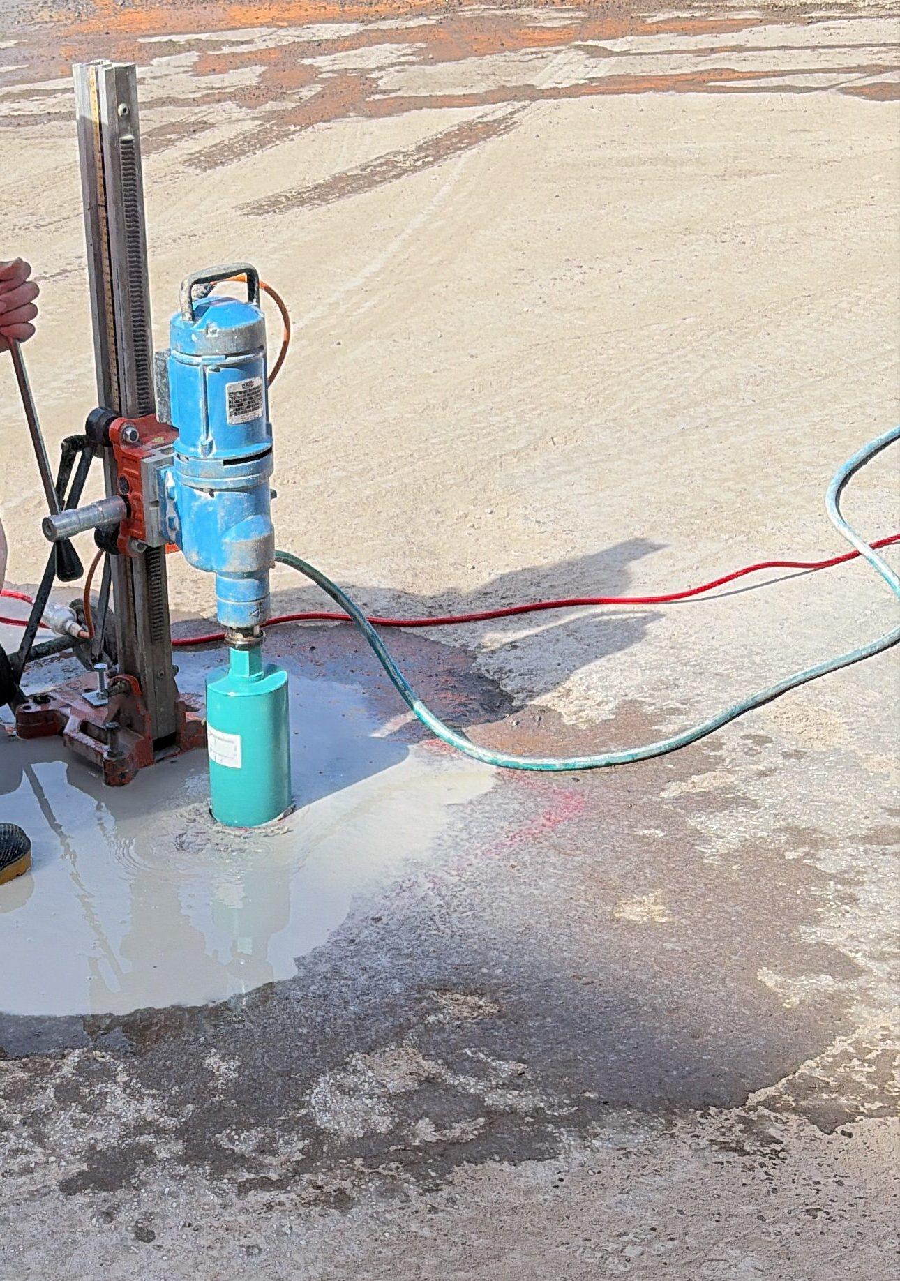 Concrete coring in progress on a major slab