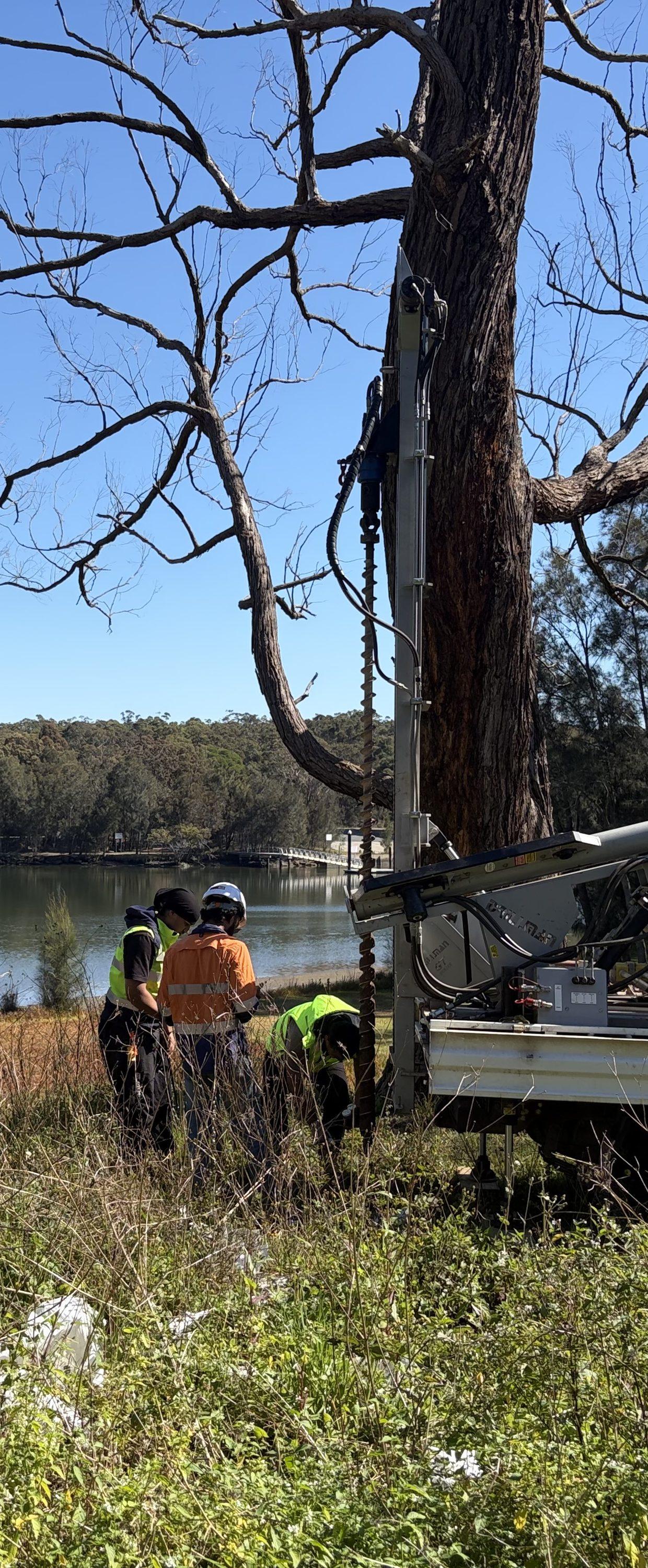 The SFGEO crew drilling beside the water on a Sydney reserve