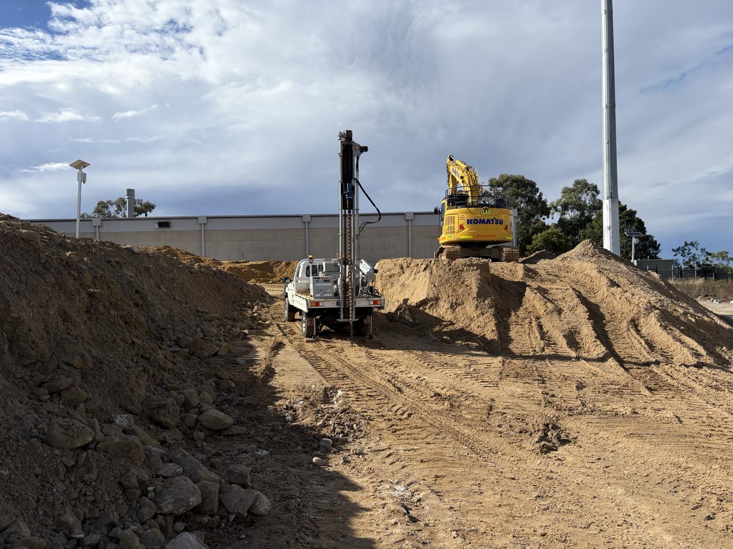 SFGEO rig drilling beside major earthworks
